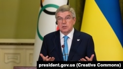 International Olympic Committee President Thomas Bach speaks during his visit to Kyiv in July.