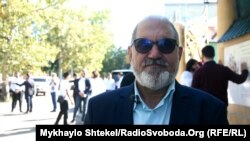 Джанат Танай