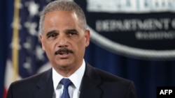 На снимке: генеральный прокурор США Эрик Холдер