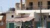 Qaddafi Defiant, Rebels Enter Key Towns