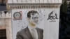 Portret Bašara el-Asada izrešetan mecima u gradu Hama, 6. decembar 2024.