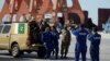 Chinese workers pose for a photograph alongside Pakistani soldiers at the port in Gwadar. (file photo)