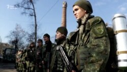 Жінки-поліцейські з Донеччини змагалися на військовому полігоні (відео) Жінки-поліцейські з Донеччини змагалися на військовому полігоні (відео)