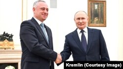 Бадра Гунба и Владимир Путин, 5 марта