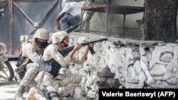 Поліцейські Гаїті під час операції проти імовірних убивць президента Моїза