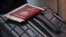  A passport and a suitcase are pictured at Vnukovo International Airport.