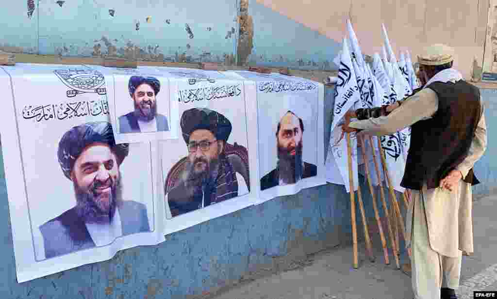A man sells Taliban flags and posters of the militant group's leaders in Kabul on August 27.    