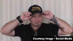 Александр Гутин