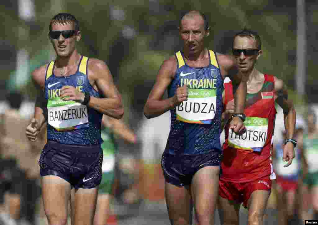 Лучший из украинцев в ходьбе на 50 километров Сергей Будза финишировал 18-м, Иван Банзерук - 38-м. Игорь Главан сошел с дистанции после 35 километров