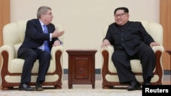 Томас Бах и Ким Чен Ын встретились в Пхеньяне, 31 марта 2018 года