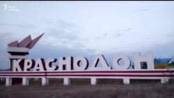 У Луганську та Криму підняли українські прапори У Луганську та Криму підняли українські прапори