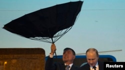 Прибытие президента России Владимира Путина на саммит в Китай, 20 мая 2014.