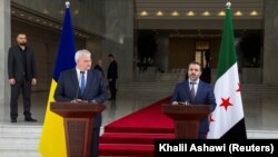 На фото - український міністр закордонних справ Андрій Сибіга зі своїм сирійським колегою Асаадом Хасаном аш-Шейбані.