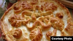 Хуплу – пирог с мясом, луком, картофелем или крупой