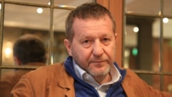 "Путина не остановят протесты". Интервью с Альфредом Кохом "Путина не остановят протесты". Интервью с Альфредом Кохом