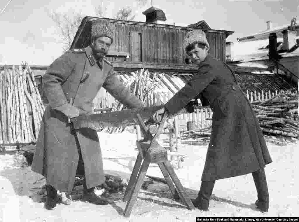 Tsar Nicholas II and his son Aleksei sawing wood while in captivity. They were killed a few months later. The diary of a senior Soviet leader recalls that Vladimir Lenin made the decision to have the Romanovs executed, after concluding &quot;we shouldn&#39;t leave the [anti-Bolshevik forces] a living emblem to rally around, especially under the present difficult circumstances.&quot;