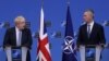 British Prime Minister Boris Johnson and NATO Secretary-General Jens Stoltenberg hold a joint news conference in Brussels on February 10.