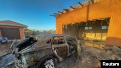 Житловий район, який постраждав від російського військового удару у селі Циркуни під Харковом, Україна, 29 травня 2022 року. Фото ілюстративне