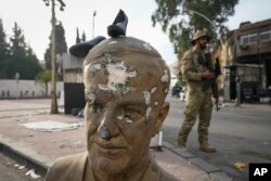 Повалена статуя покійного президента Сирії Хафеза Асада, Дамаск, Сирія, 11 грудня 2024 року