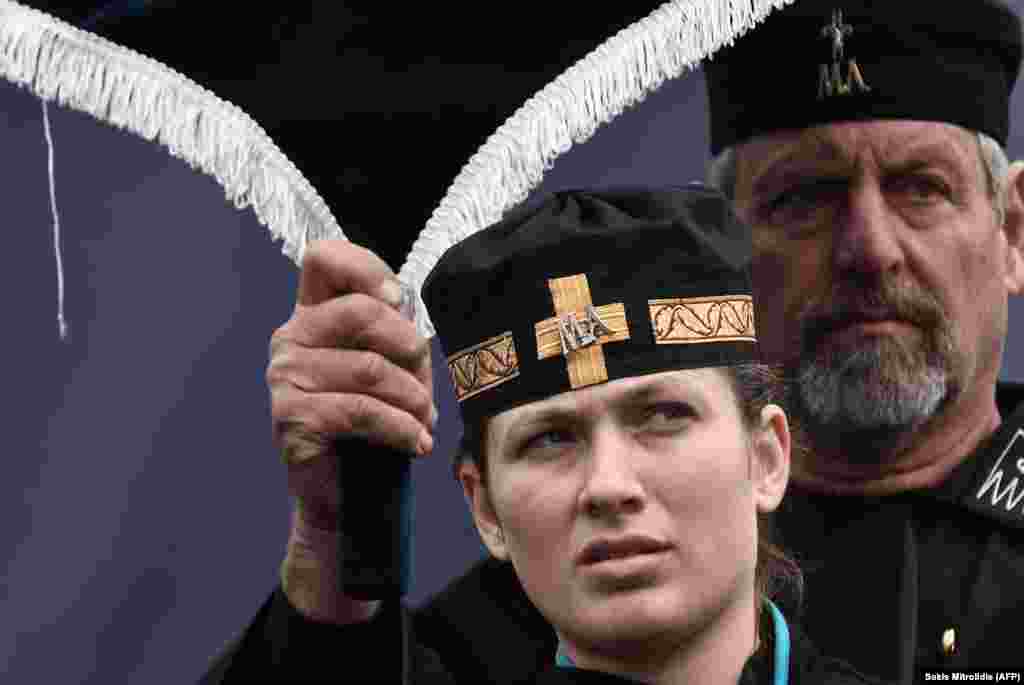 Greeks in traditional clothing during the protest. The current dispute over the name "Macedonia" dates back to the early 1990s and the breakup of the former Yugoslavia. In 1993, Macedonia was admitted into the United Nations under the "provisional" name The Former Yugoslav Republic Of Macedonia, or FYROM, although most have since adopted simply Republic Of Macedonia.