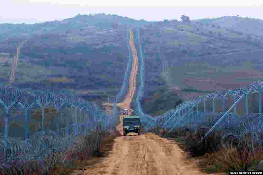 A military vehicle patrols the Greece-Macedonia border in 2016. Athens says Skopje's use of the name "Macedonia" suggests irredentist and territorial claims over Greece's northern region of the same name.
