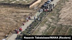 Тіла загиблих біля місця катастрофи, околиці Тегерану, 8 січня 2020 року