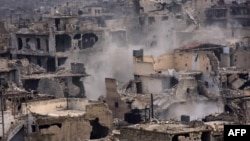Пострадавшие при бомбардировках районы Алеппо (архивное фото)