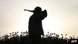 Боец оппозиционной сирийской группировки в городе Дераа