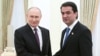 Russian President Vladimir Putin (left) and Rustam Emomali, the son of Tajik President Emomali Rahmon meet at the Kremlin. (file photo)