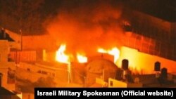 Гробница Иосифа в огне, после нападения палестинских радикалов 15 октября 2015 г.