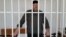Оюб Титиев на слушаниях по делу о продлении своего ареста в Старопромысловском суде Грозного, Чечня. 25 апреля 2018 года