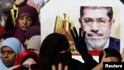Демонстрация сторонников Мохаммеда Мурси в пригороде Каира (1 ноября 2013 года)