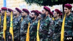 Бійці «Хезболли» на церемонії прощання із убитими Ізраїлем лідерами руху. Бейрут, Ліван. 25 вересня 2024 року