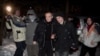 The release from prison of Uladzimer Nyaklyaeu (center left) on January 29