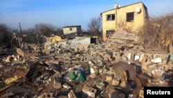 Житлові будинки, які постраждали під час російського ракетного удару та удару БпЛА у місті Кам’янське Дніпропетровської області, Україна, 29 березня 2024 року. Фото ілюстративне