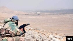 Один из сирийских военных, участвующих в операции в Пальмире