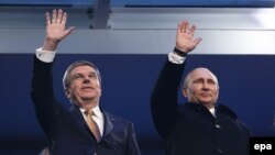 Томас Бах и Владимир Путин на открытии Олимпиады в Сочи 2014 г.