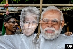 Протесты в Индии против импортных пошлин Соединенных Штатов