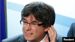 Карлес Пучдемон на пресс-конференции в Брюсселе, 22 декабря 2017 года