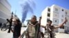 Rebels Continue Hunt For Qaddafi As UN Unfreezes Funds 